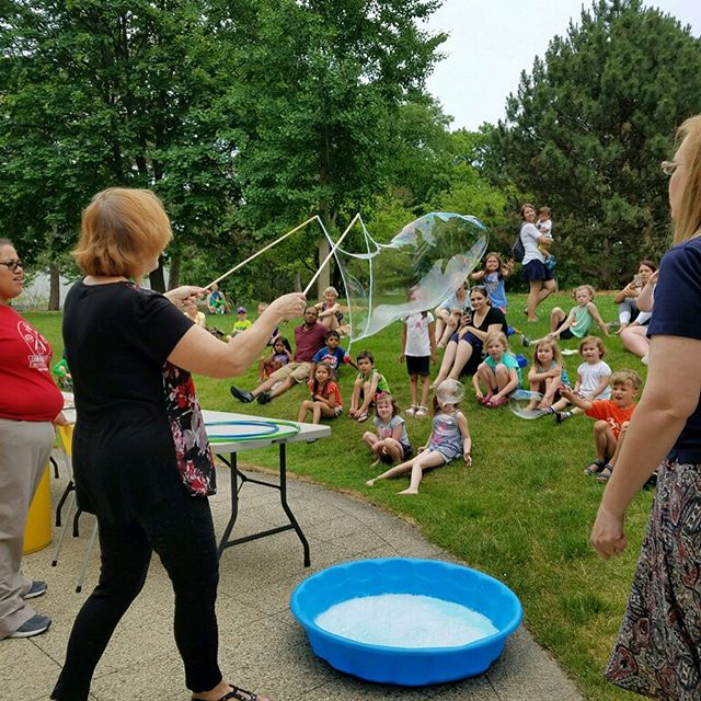 There's nothing like #science in the great outdoors! Today was all about #bubbles. Come next Wednesday for more Outdoor Science Fun! #campcuriosity #elmhurstil #library