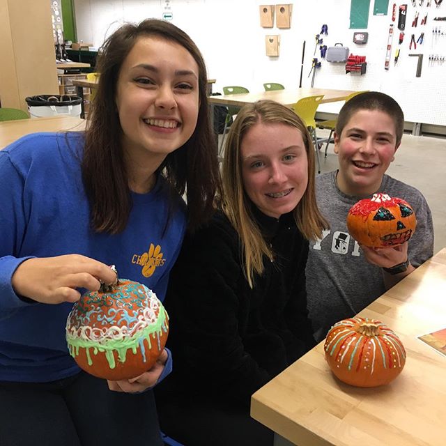 Halloween is almost here!  These teens got creative in the #makerspace painting glow-in-the-dark pumpkins. #create #elmhurstmakery #halloweeniscoming