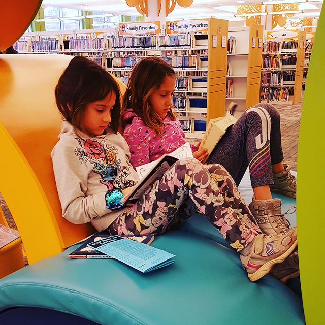 Reading buddies. #learninggarden #elmhurstpubliclibrary #read